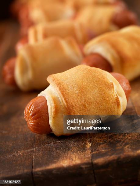 pigs in a blanket - sausage roll stock pictures, royalty-free photos & images