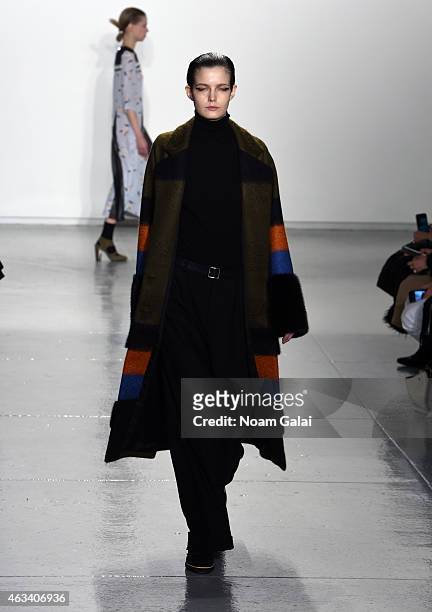Model walks the runway at the Suno fashion show during Mercedes-Benz Fashion Week Fall 2015 at Center 548 on February 13, 2015 in New York City.