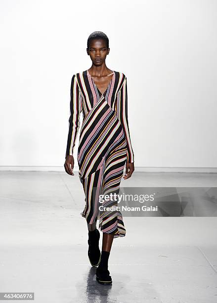 Model walks the runway at the Suno fashion show during Mercedes-Benz Fashion Week Fall 2015 at Center 548 on February 13, 2015 in New York City.