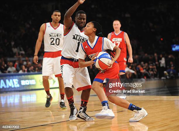 Kevin Hart and Mo'ne Davis attends the NBA All-Star Celebrity Game NBA All -Star Weekend 2015 on February 13, 2015 in New York City.