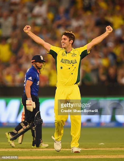 Mitchell Marsh of Australia celebrates with team-mates Steve after taking his fifth wicket of England's Jos Buttler during the 2015 ICC Cricket World...