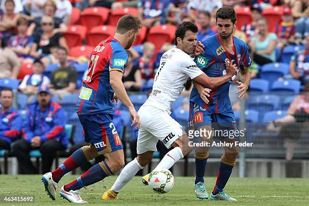 Labinot Haliti of the Wanderers is contested by the Jets defence during the round 17 A-League match between the Newcastle Jets and the Western Sydney...
