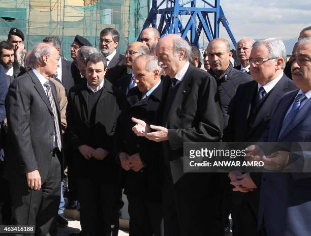 Lebanese Druze leader and Lebanese Progressive Socialist Party chairman Walid Jumblatt recites the Fatiha or the prayer of the dead, at the burial...