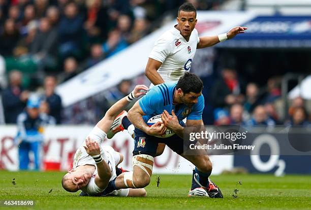 Mike Brown of England clashes with Andrea Masi of Italy during the RBS Six Nations match between England and Italy at Twickenham Stadium on February...