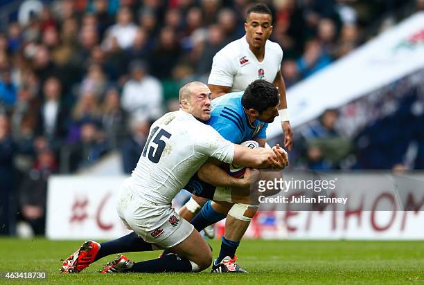 Mike Brown of England clashes with Andrea Masi of Italy during the RBS Six Nations match between England and Italy at Twickenham Stadium on February...
