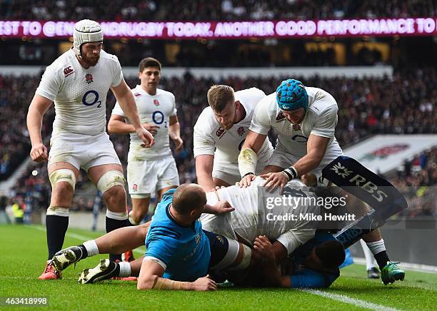 Billy Vunipola of England goes over to score his try during the RBS Six Nations match between England and Italy at Twickenham Stadium on February 14,...