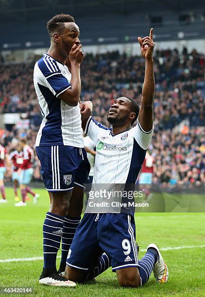 Brown Ideye of West Bromwich Albion celebrates with team mate Saido Berahino as he scores their first goal during the FA Cup Fifth Round match...