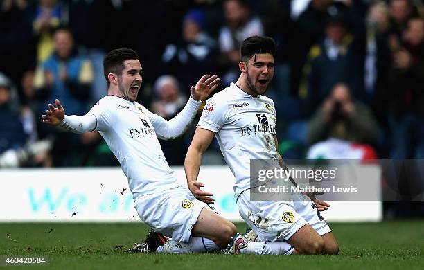 Alex Mowatt of Leeds United celebrates his goal with Lewis Cook during the Sky Bet Championship match between Leeds United and Millwall at Elland...