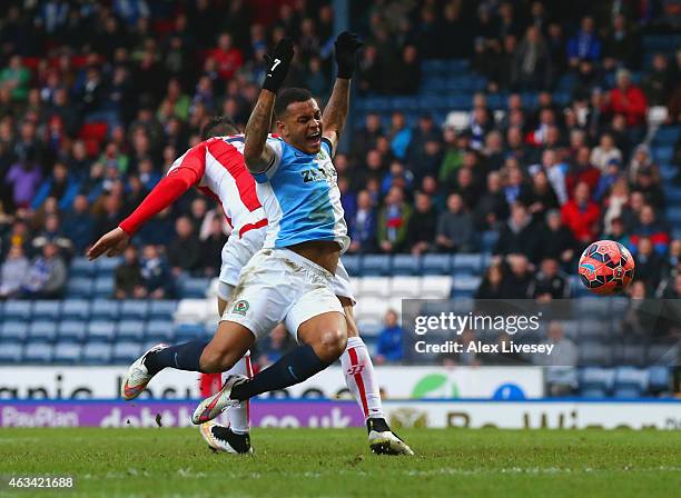 Joshua King of Blackburn is fouled by Geoff Cameron of Stoke City to win a penalty during the FA Cup Fifth Round match between Blackburn Rovers and...