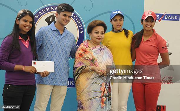 Madhavi Raje Scindia, mother of Jyotiraditya Madhavrao Scindia, Member of Parliament, presents the prize to Vani Kapoor, Neha Tripathi and Gauri...