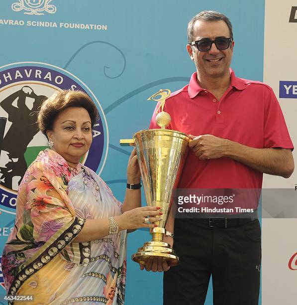 Madhavi Raje Scindia, mother of Jyotiraditya Madhavrao Scindia, Member of Parliament, presents the overall trophy to Arunjit Sodhi in 10th edition of...