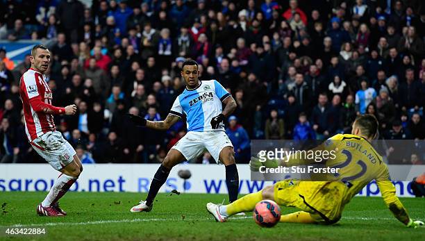 Stoke goalkeeper Jack Butland is beaten by a shot from Josh King of Blackburn to score their third goal during the FA Cup Fifth round match between...