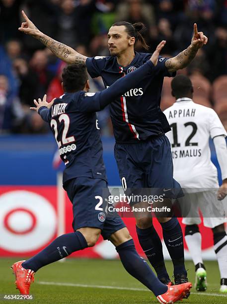 Zlatan Ibrahimovic of PSG celebrates his goal during the French Ligue 1 match between Paris Saint-Germain FC and Stade Malherbe Caen at Parc des...