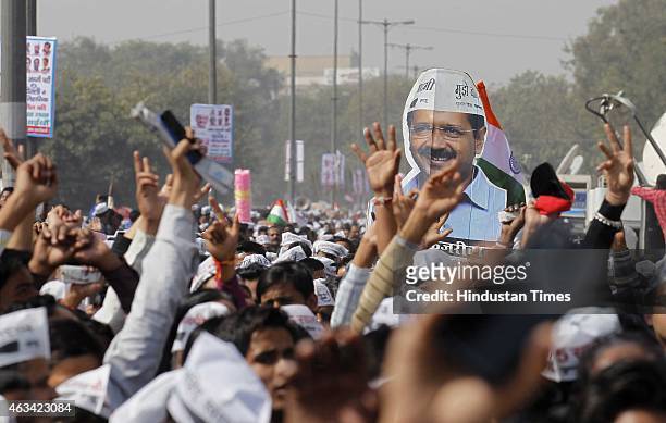 Supporters during the swearing-in ceremony of Arvind Kejriwal as Delhi chief minister at the Ramlila Ground on February 14, 2015 in New Delhi, India....