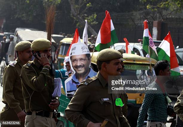 Aam Aadmi Party supporter outside the Ramlila Maidan during the swearing in ceremony of AAP leader Arvind Kejriwal on February 14, 2015 in New Delhi,...