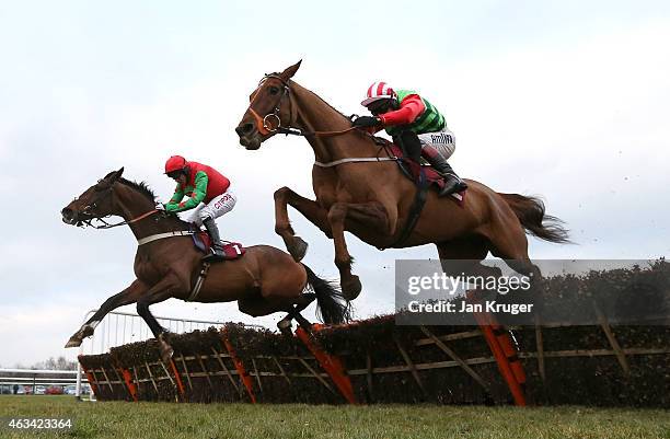 Definitly Red ridden by Richard Johnson wins the Albert Bartlett Novices Hurdle Race at Haydock Races on February 14, 2015 in Haydock, England.