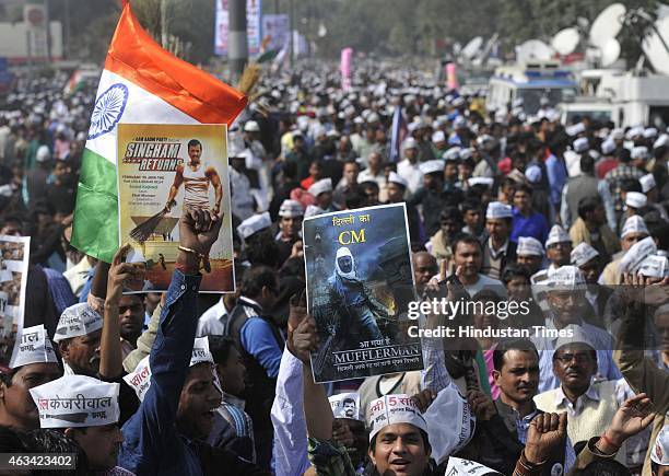 Supporters of the Aam Aadmi Party during the swearing-in ceremony of AAP leader Arvind Kejriwal at the Ramlila Ground on February 14, 2015 in New...