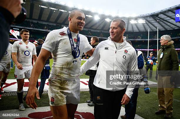 England head coach Stuart Lancaster congratulates Jonathan Joseph of England after the RBS Six Nations match between England and Italy at Twickenham...