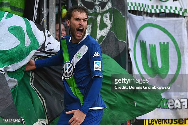 Bast Dost of VfL Wolfsburg celebrates as he scores the winning goal during the Bundesliga match between Bayer 04 Leverkusen and VfL Wolfsburg at...