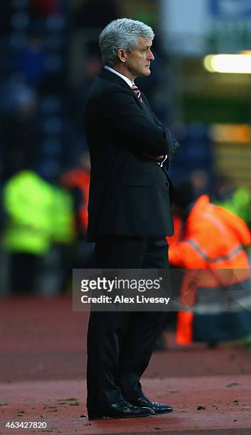 Manager Mark Hughes of Stoke City looks on during the FA Cup Fifth Round match between Blackburn Rovers and Stoke City at Ewood park on February 14,...