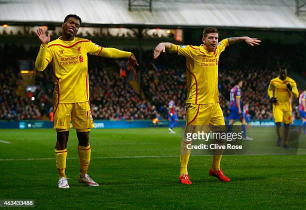 Daniel Sturridge of Liverpool celebrates scoring their first goal with Alberto Moreno of Liverpool during the FA Cup fifth round match between...