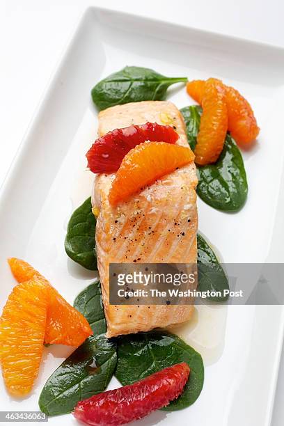 Salmon in Orange Sauce photographed in Washington, DC. Tableware from Crate and Barrel. Photo by Deb Lindsey/For The Washington Post via Getty Images)