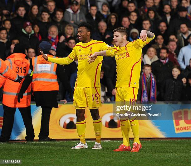 Daniel Sturridge and Alberto Moreno of Liverpool dance after scoring an equalising goal during the FA Cup Fifth Round match between Crystal Palace...