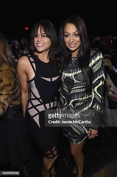 Actress Michelle Rodriguez and TV personality La La Anthony pose for a photo backstage at Herve Leger By Max Azria at The Theatre at Lincoln Center...