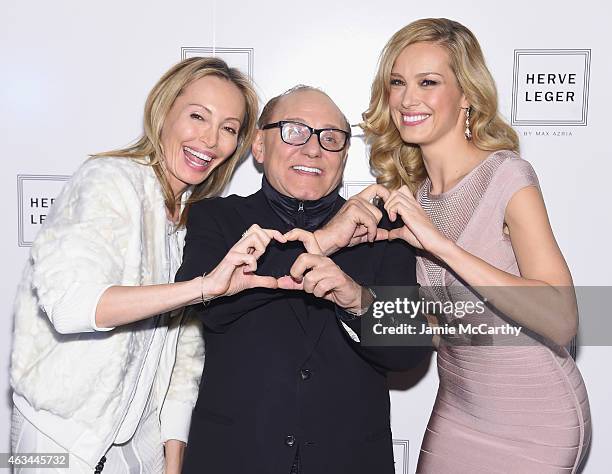 Lubov Azria, designer Max Azria and model Petra Nemcova pose backstage at the Herve Leger By Max Azria fashion show during Mercedes-Benz Fashion Week...