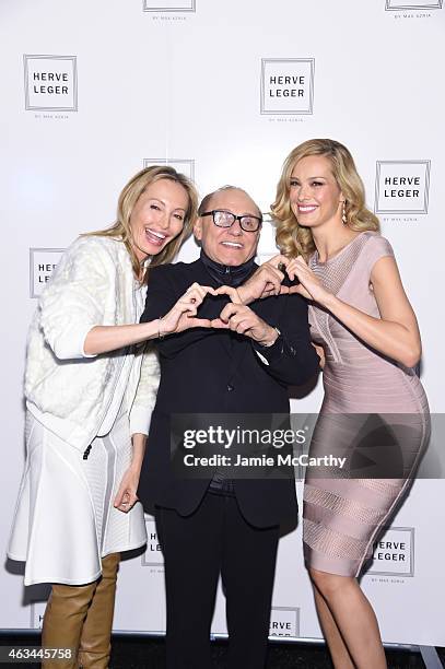 Lubov Azria, designer Max Azria and model Petra Nemcova pose backstage at the Herve Leger By Max Azria fashion show during Mercedes-Benz Fashion Week...