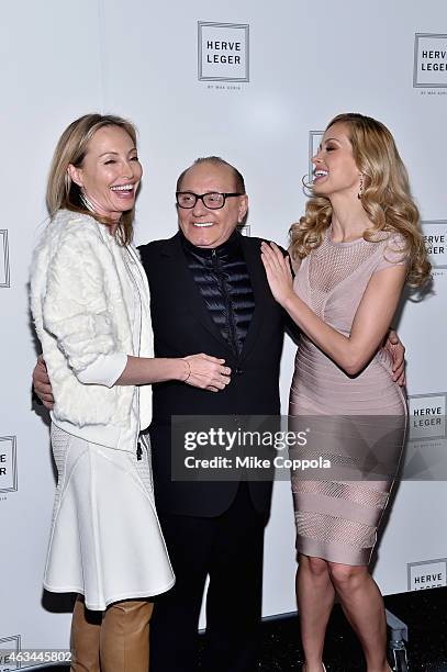 Lubov Azria, designer Max Azria and model Petra Nemcova pose backstage at the Herve Leger By Max Azria fashion show during Mercedes-Benz Fashion Week...