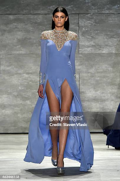 Model Alisar Ailabouni walks the runway at the Idan Cohen fashion show during Mercedes-Benz Fashion Week Fall 2015 at The Pavilion at Lincoln Center...