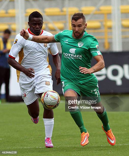 Martin Icart of La Equidad struggles for the ball with Victor Zapata of Aguilas Pereira during a match between La Equidad and Aguilas Pereira as part...