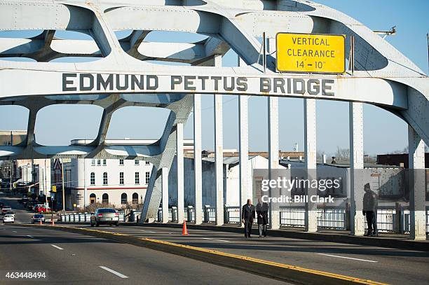 Rep. John Lewis, D-Ga., walks across the Edmund Pettus Bridge with Bob Schieffer of CBS News on Saturday, Feb. 14, 2015. Rep. Lewis was beaten by...