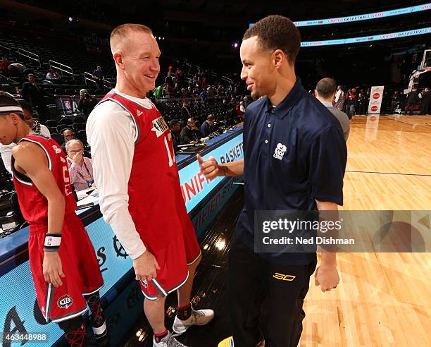 Former NBA Player Chris Mullin and Stephen Curry of the Golden State Warriors talk during NBA Cares Special Olympics Unified Sports Game as part of...