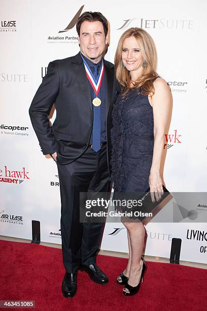 John Travolta and Kelly Preston arrive for the 11th Annual Living Legends Of Aviation Awards at The Beverly Hilton Hotel on January 17, 2014 in...