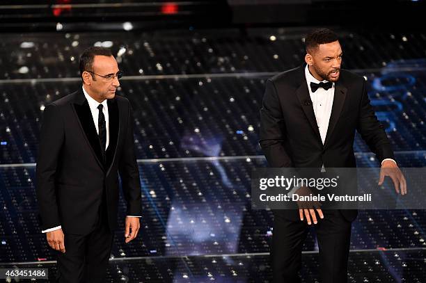 Carlo Conti and Will Smith attend the closing night of 65th Festival di Sanremo 2015 at Teatro Ariston on February 14, 2015 in Sanremo, Italy.