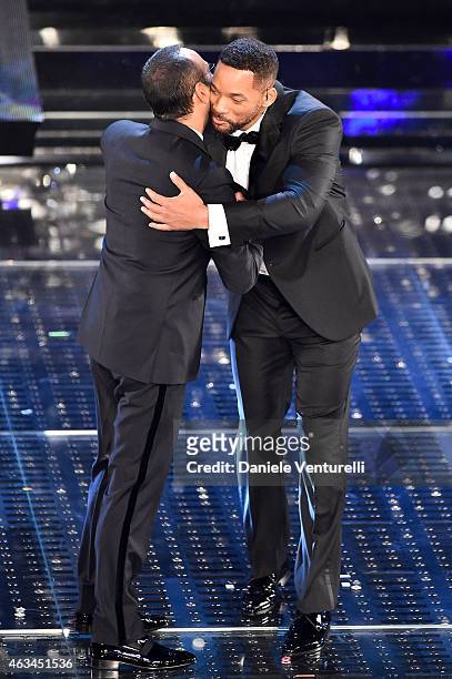 Carlo Conti and Will Smith attend the closing night of 65th Festival di Sanremo 2015 at Teatro Ariston on February 14, 2015 in Sanremo, Italy.