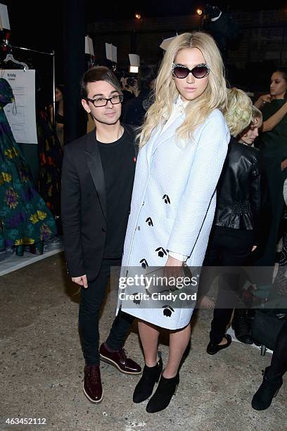 Designer Christian Siriano and Kesha poses backstage at the Christian Siriano Fashion Show at ArtBeam on February 14, 2015 in New York City.