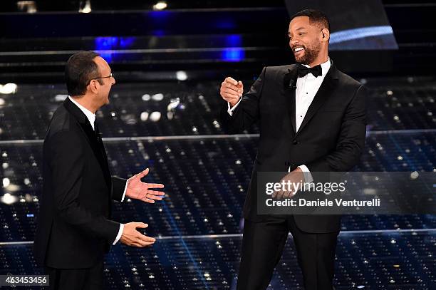 Carlo Conti and Will Smith attend the closing night of 65th Festival di Sanremo 2015 at Teatro Ariston on February 14, 2015 in Sanremo, Italy.