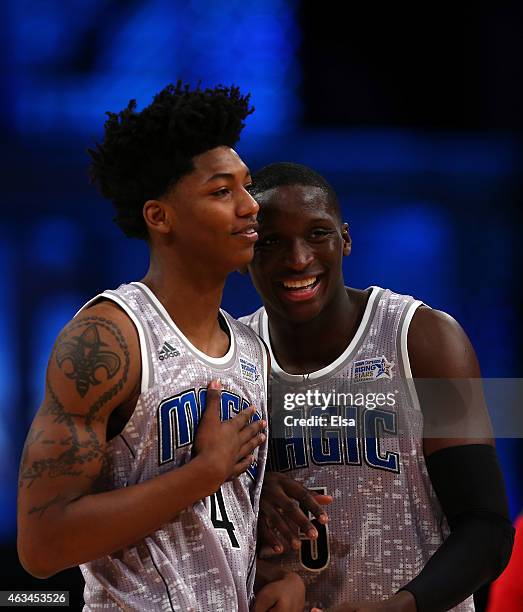 Team's Elfrid Payton of the Orlando Magic reacts with U.S. Team's Victor Oladipo of the Orlando Magic during the BBVA Compass Rising Stars Challenge...