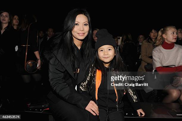 Aimie Wang and Alia Wang attend the Alexander Wang Fashion Show during Mercedes-Benz Fashion Week Fall 2015 at Pier 94 on February 14, 2015 in New...