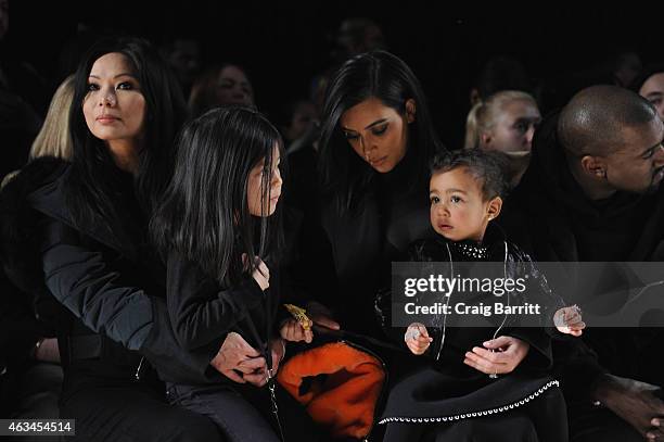 Aimie Wang, Alia Wang, Kim Kardashian, North West and Kanye West attend the Alexander Wang Fashion Show during Mercedes-Benz Fashion Week Fall 2015...