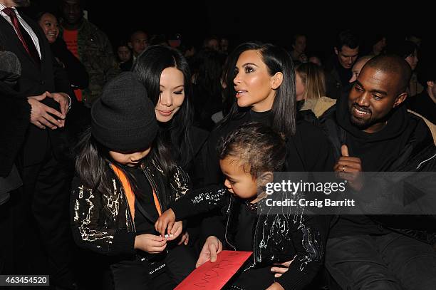Aimie Wang, Alia Wang, Kim Kardashian, North West and Kanye West attend the Alexander Wang Fashion Show during Mercedes-Benz Fashion Week Fall 2015...