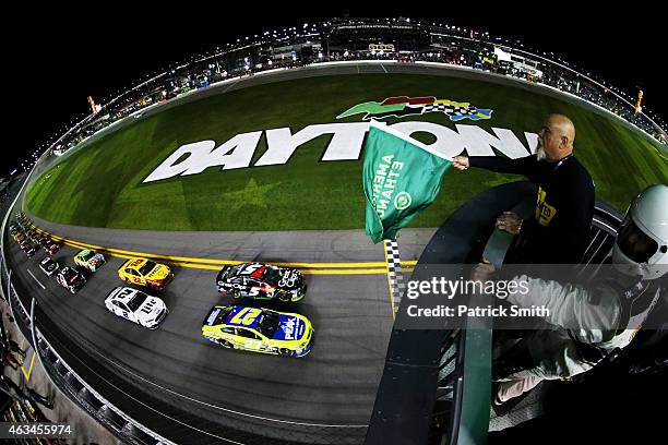 Paul Menard, driver of the Peak/Menard's Chevrolet, leads the field to the green flag to start the 3rd Annual Sprint Unlimited at Daytona at Daytona...