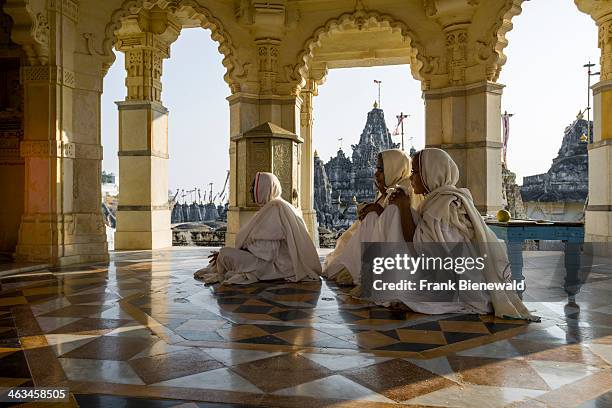 Group of Jain nuns is visiting a temple at Shatrunjaya hill, one of the major pilgrim sites for Jains, on the opening day of the yatra season.