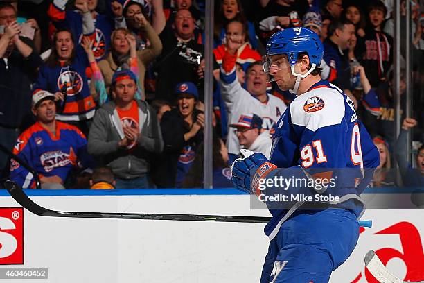 John Tavares of the New York Islanders celebrates his third period goal against the Columbus Blue Jackets at Nassau Veterans Memorial Coliseum on...