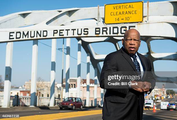 Rep. John Lewis, D-Ga., stands on the Edmund Pettus Bridge in Selma, Ala., in between television interviews on Feb. 14, 2015. Rep. Lewis was beaten...