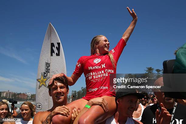 Laura Enever of Australia is chaired up the beach after winning the Women's final of the Australian Open of Surfing on February 15, 2015 in Sydney,...