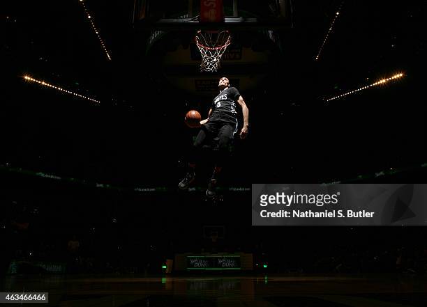 Zach LaVine of the Minnesota Timberwolves dunks during the Sprite Slam Dunk Contest on State Farm All-Star Saturday Night as part of the 2015 NBA...